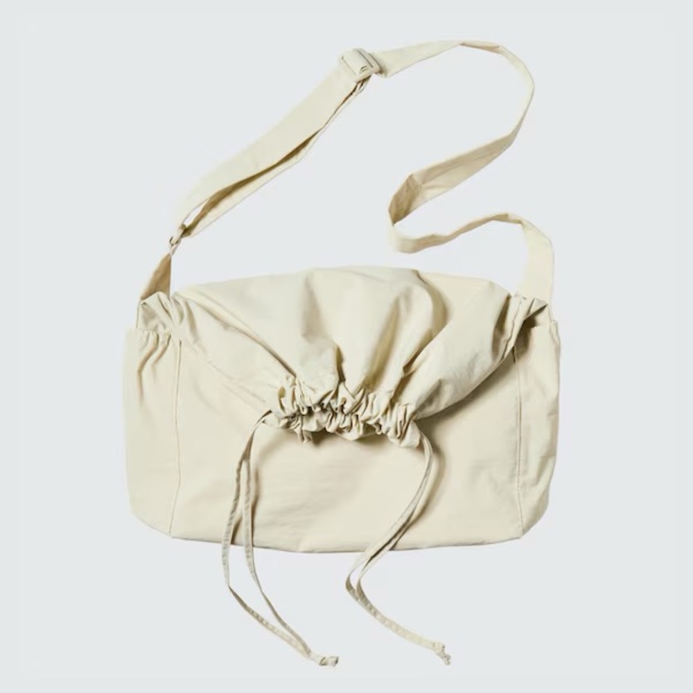 Uniqlo Cream Drawstring Crossbody Bag
